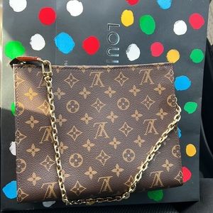 Authentic Louis Vuitton toiletry pouch on chain